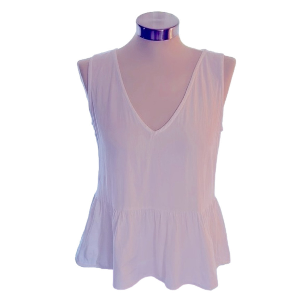 WHITE blouse Sim&Sam brand 100% rayon .. Lose fit high front low back. ..